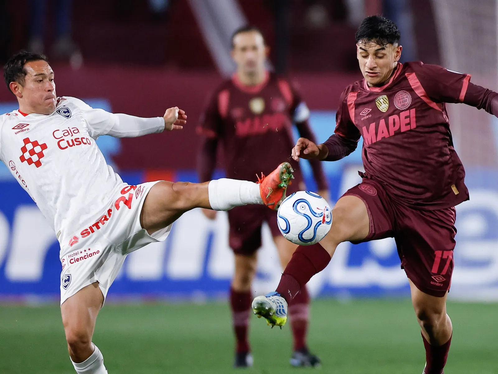 Lanús players in action during a Copa Sudamericana match against Cienciano