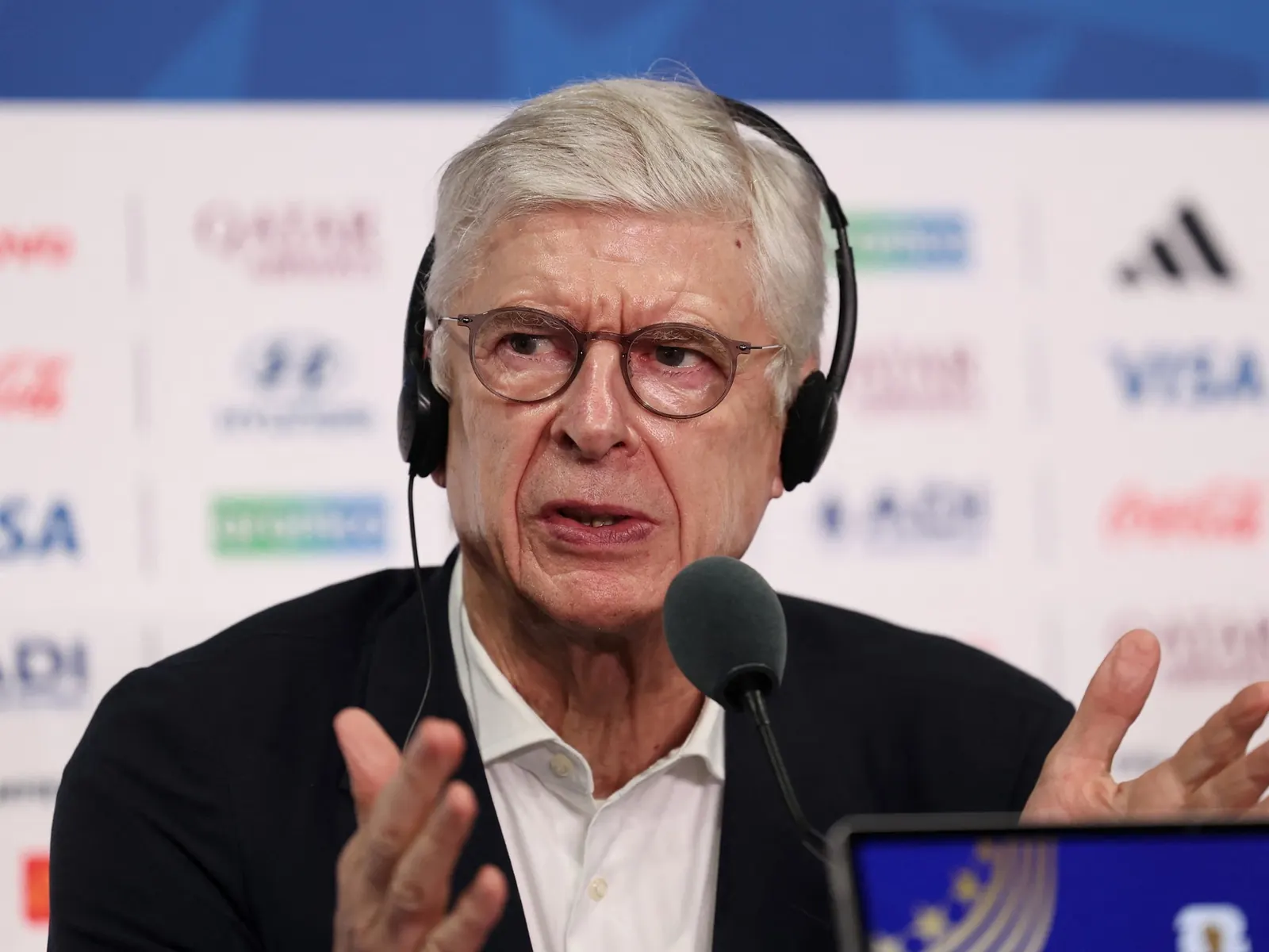 Arsene Wenger speaking at a press conference