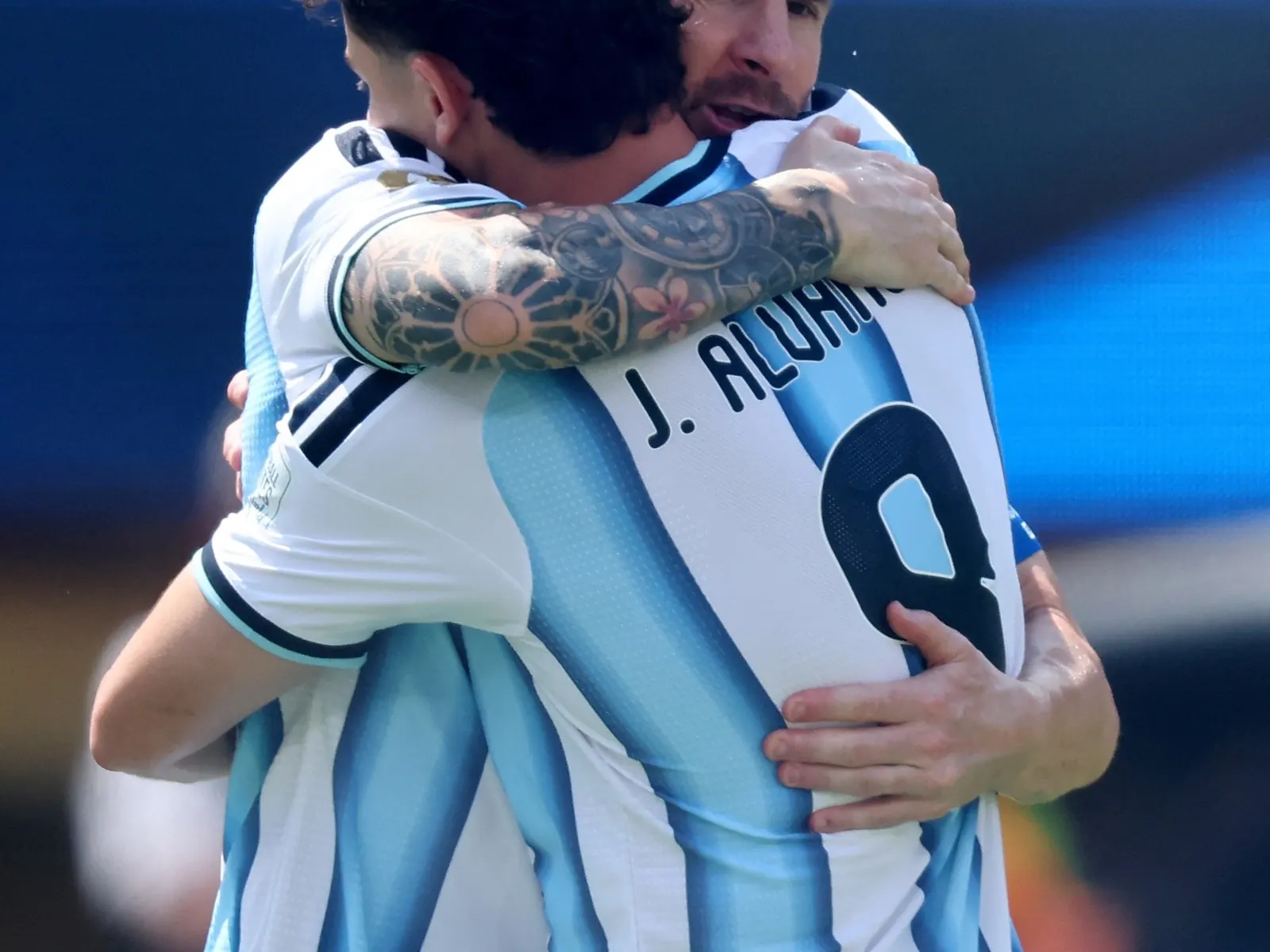 Lionel Messi celebrating with Argentina teammates during a World Cup match