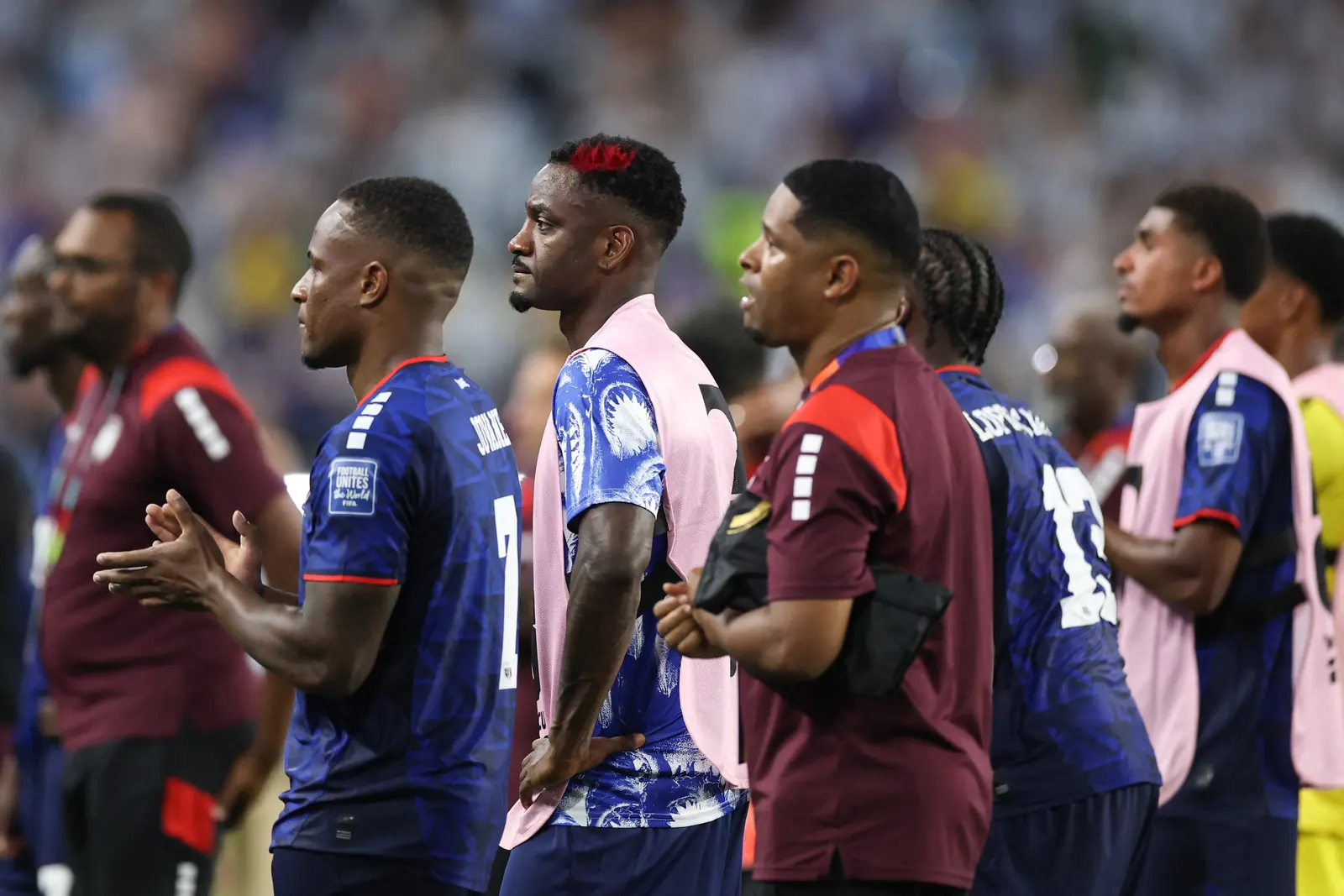 Cabo Verde players celebrating a goal during their FIFA World Cup match against Argentina.