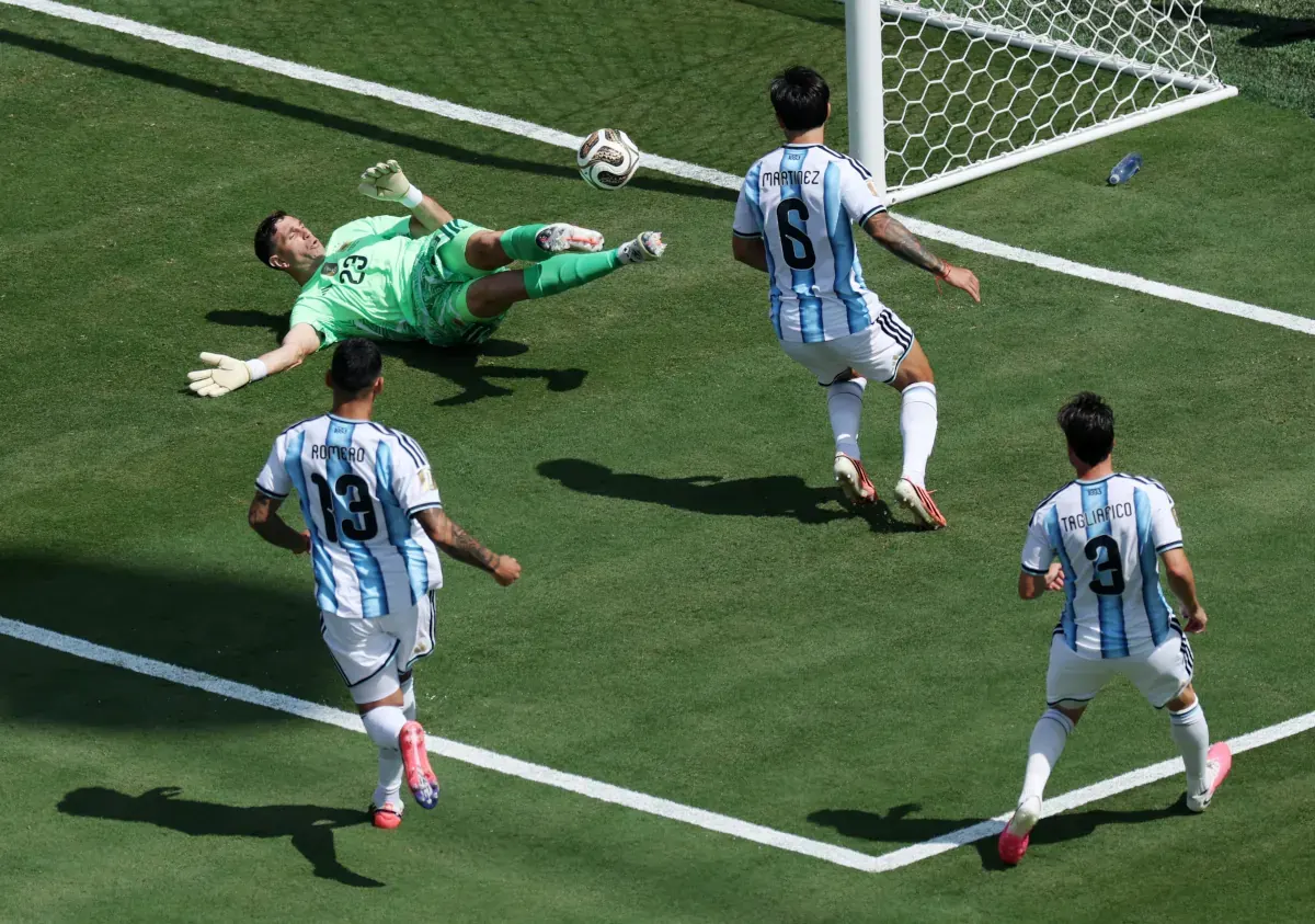 Emiliano Martinez making a save for Argentina during the FIFA World Cup 2026 final against Spain.