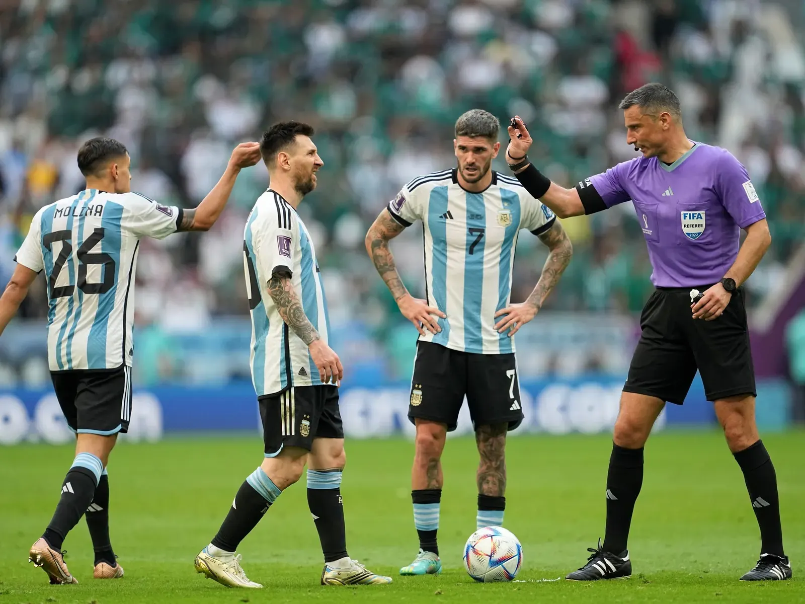 A symbolic image representing the FIFA World Cup Final, featuring the trophy and a referee's whistle.