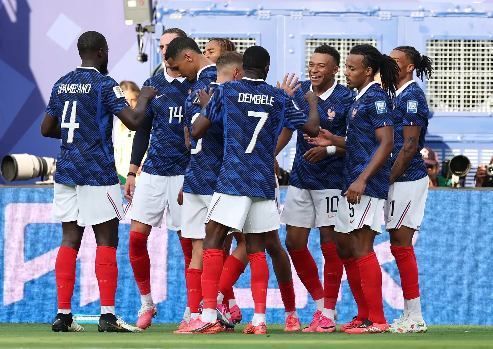 French national football team players celebrating a goal during a FIFA World Cup match.