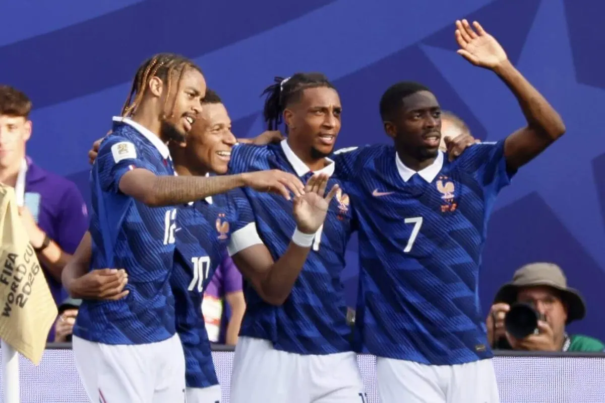 Kylian Mbappe celebrates scoring for France during a World Cup match.