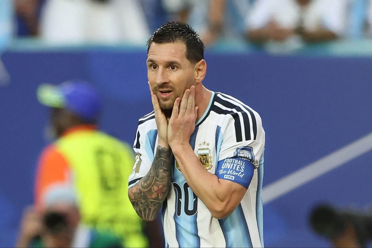 Argentina players celebrating a goal during a FIFA World Cup match.