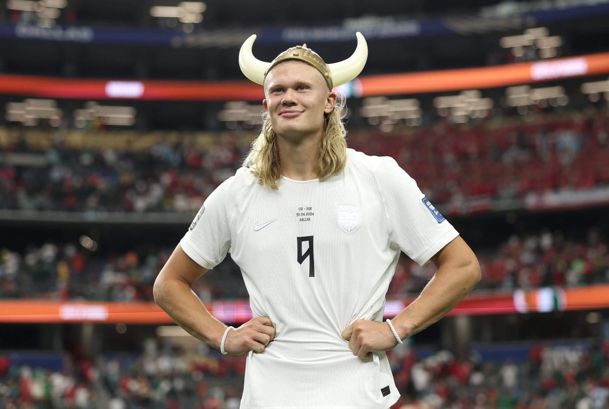 Erling Haaland celebrating a goal for Norway during a FIFA World Cup match.