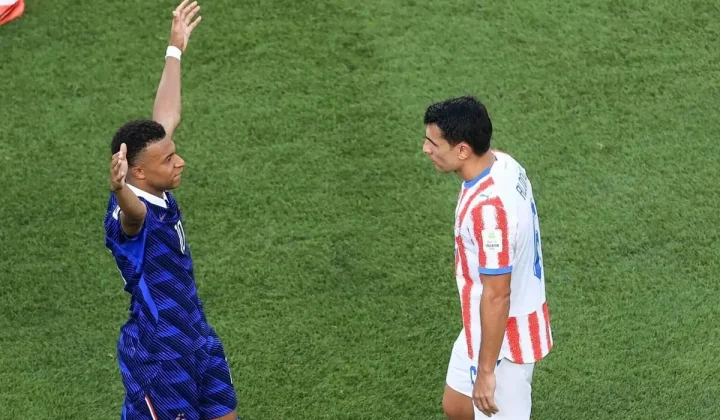 Mbappe Levels Messi in Golden Boot Race as Paraguay’s Aggressive Tactics Questioned