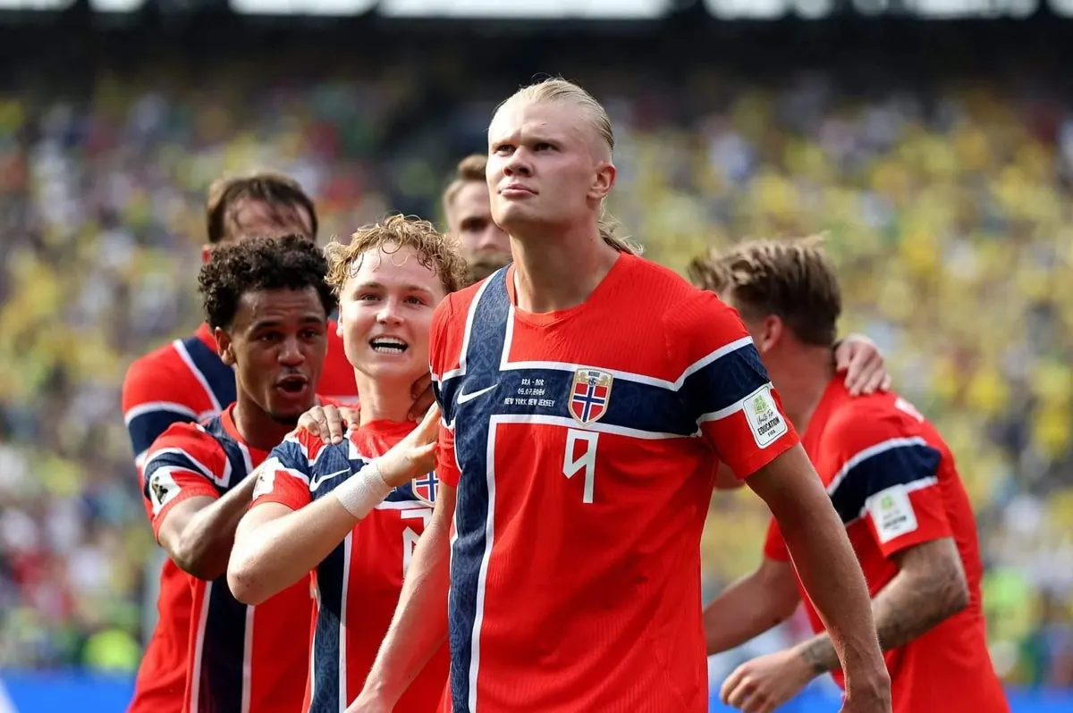 Erling Haaland celebrates scoring a goal for Norway during a World Cup match.