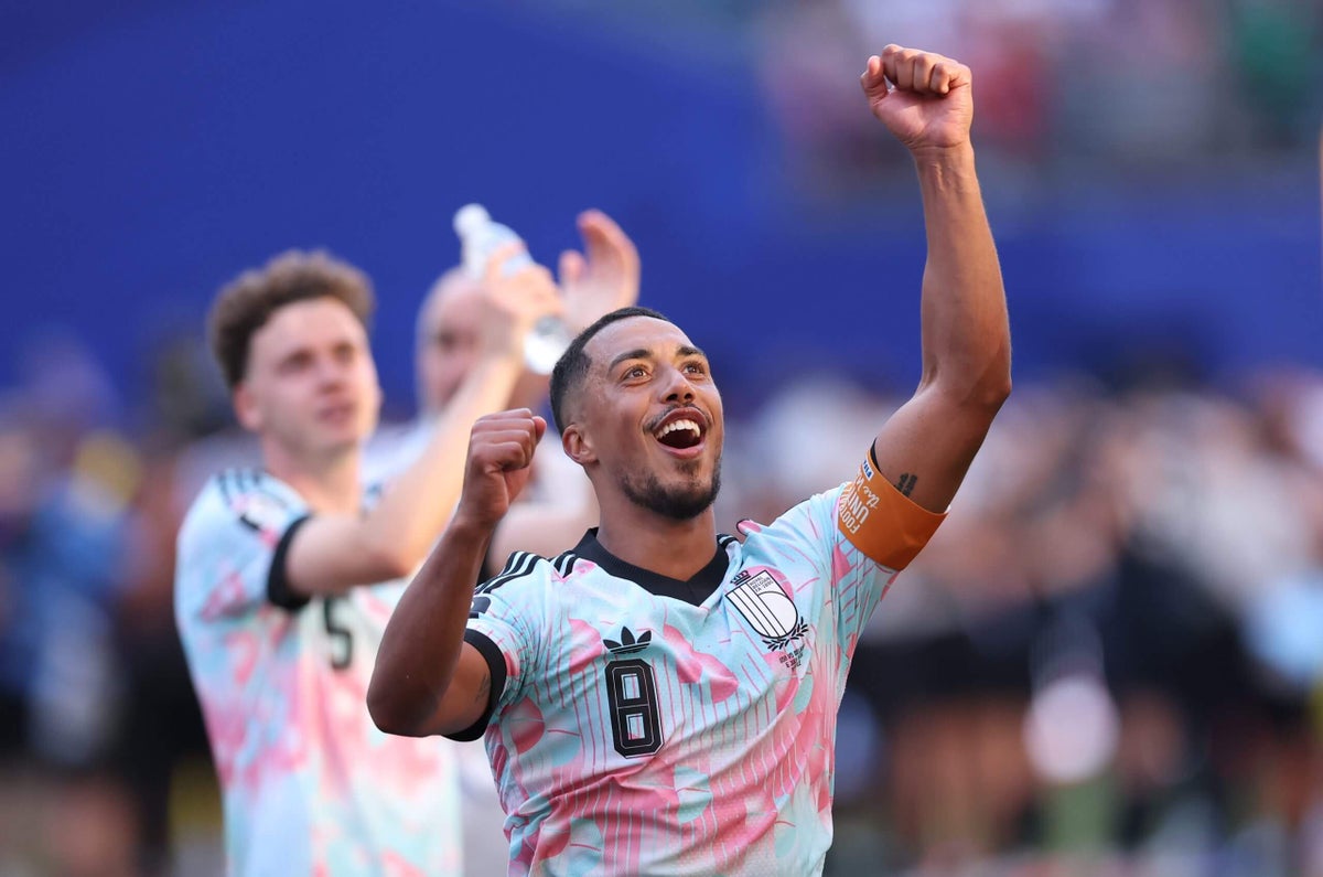 Belgium players celebrating a goal during their FIFA World Cup 2026 quarter-final victory.