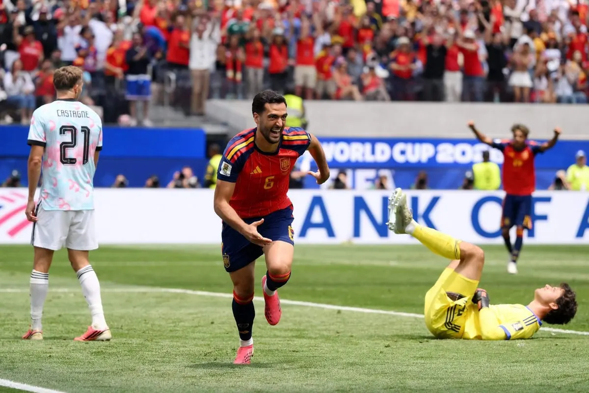Mikel Merino, Spain's midfielder, celebrates a crucial goal during a World Cup match.
