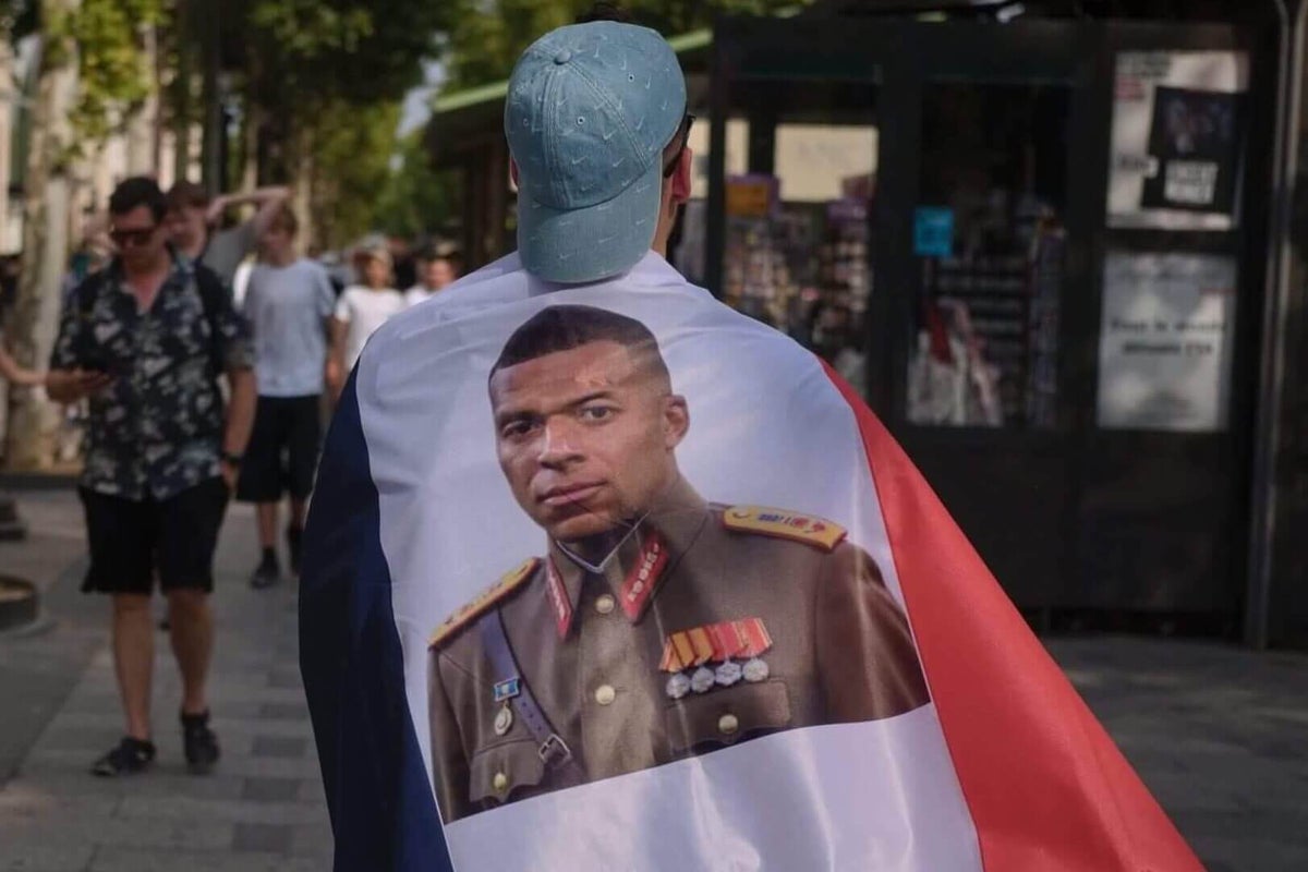 Kylian Mbappe, France national football team captain, on the pitch during a World Cup match.