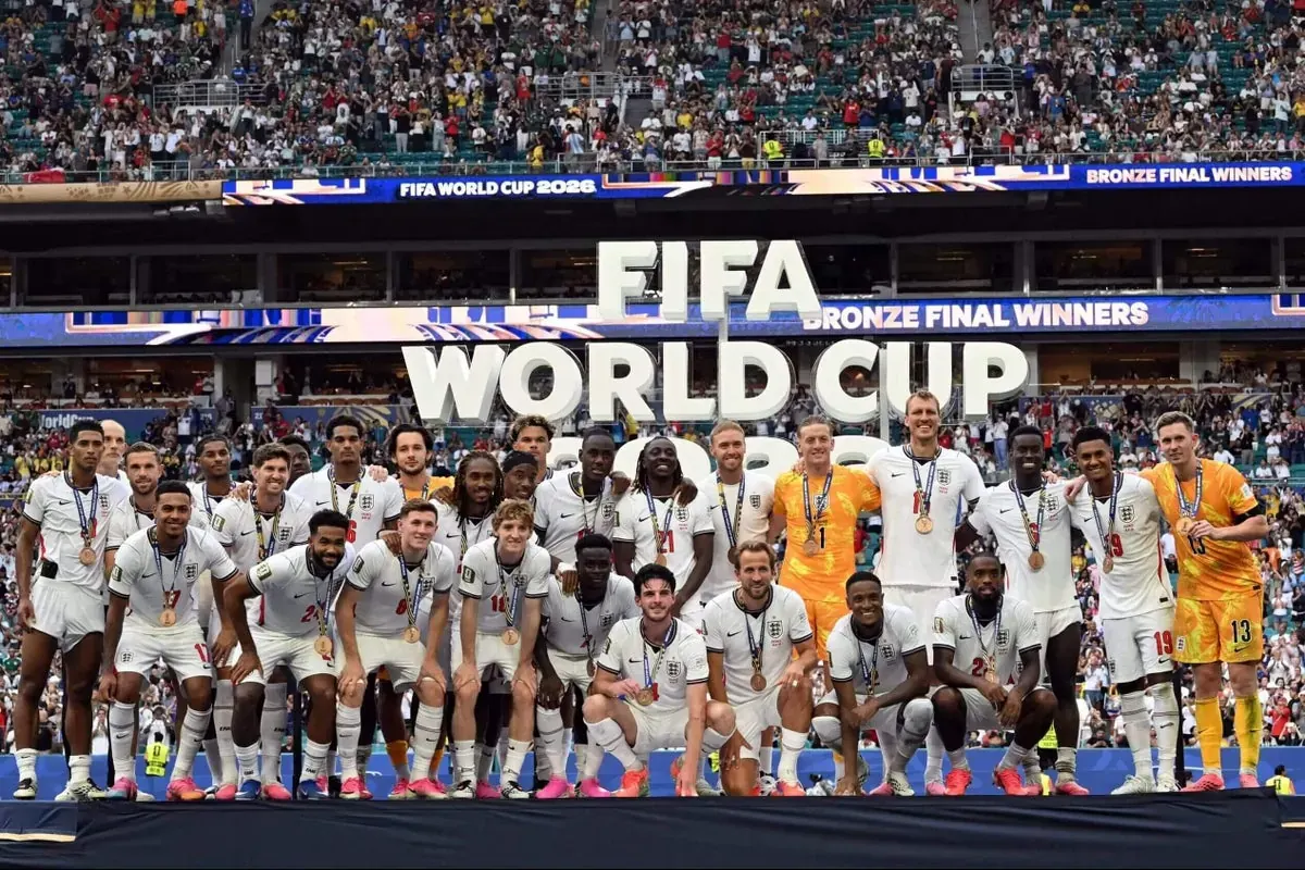 England players celebrate their bronze medals after a chaotic third-place playoff match at the FIFA World Cup.