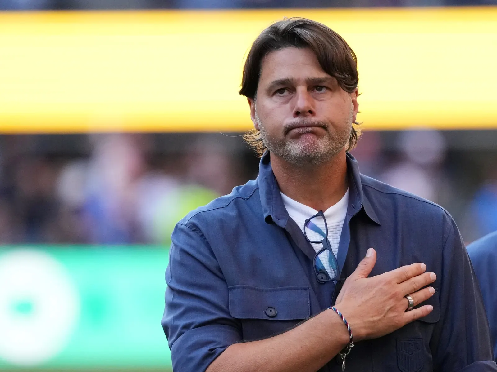 Mauricio Pochettino, head coach of the United States men’s national team, directing play from the sideline during a World Cup match.
