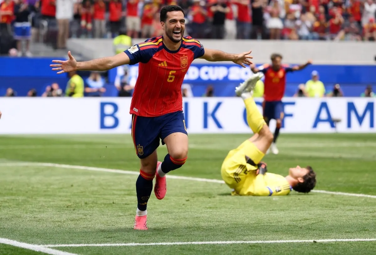 Spain players celebrate a goal during their FIFA World Cup 2026 quarter-final match against Belgium.