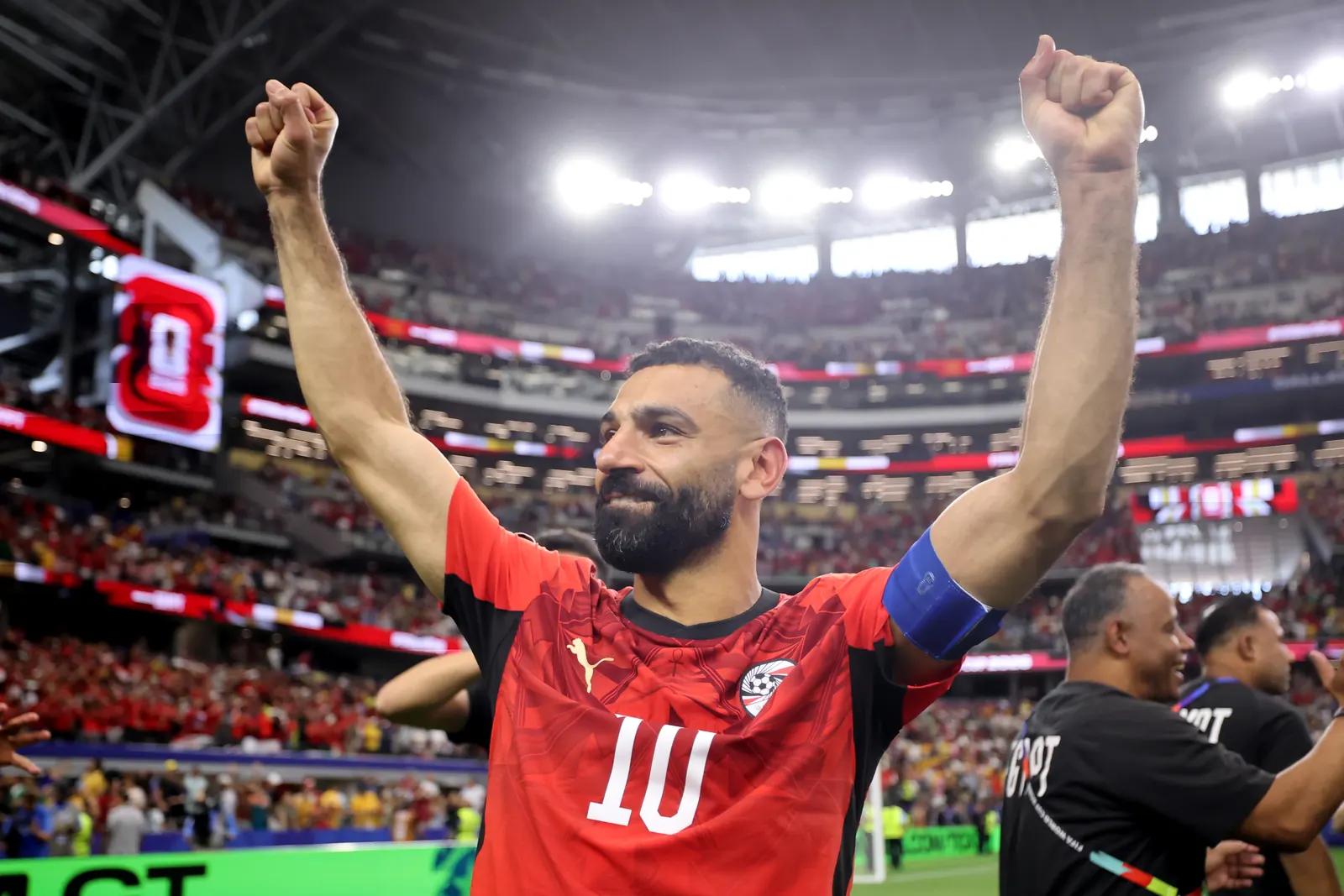 Mohamed Salah smiles as he celebrates a goal for Egypt