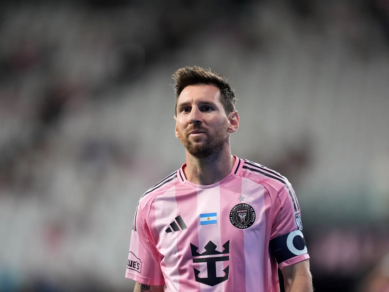 Lionel Messi in Inter Miami jersey on the pitch during a game