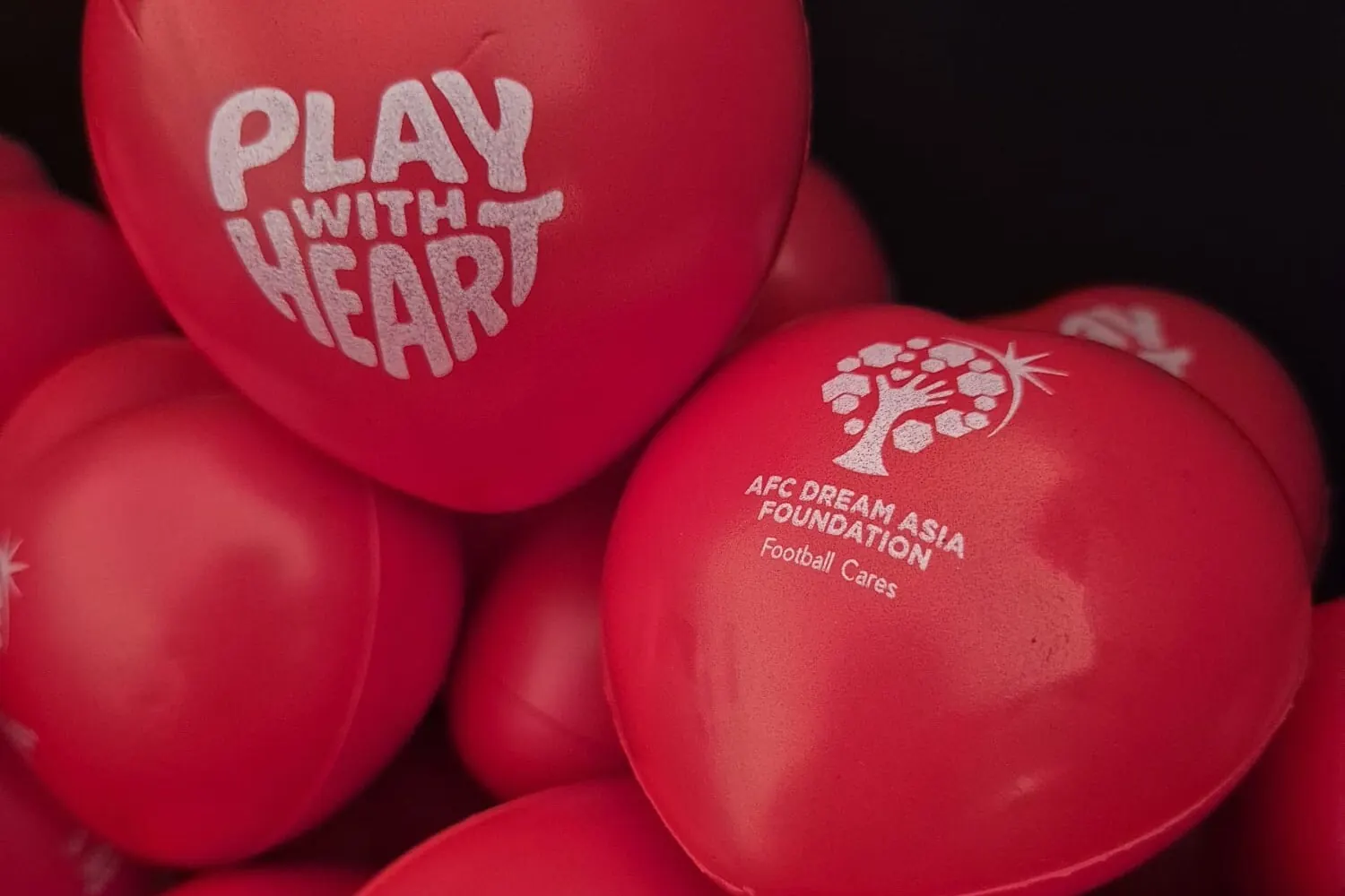Graphic representing the AFC Women's Asian Cup 2026 and heart health awareness