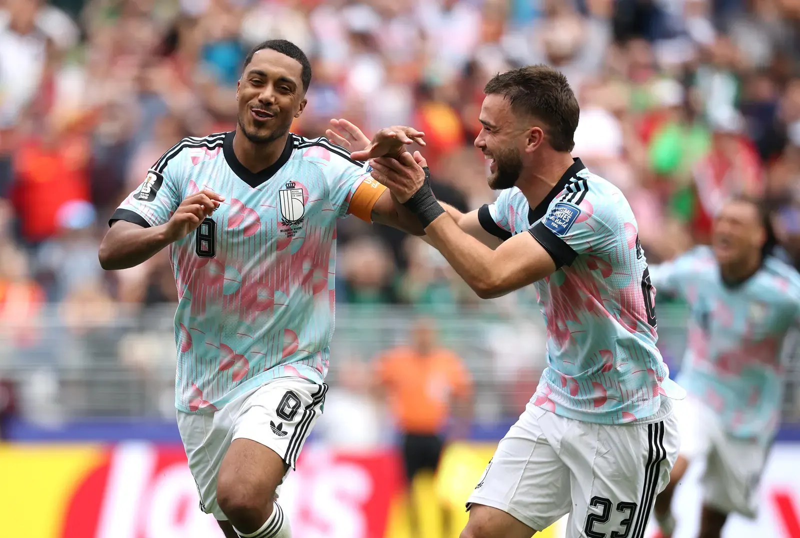 Belgium players celebrate a goal during their FIFA World Cup 2026 match against Senegal.