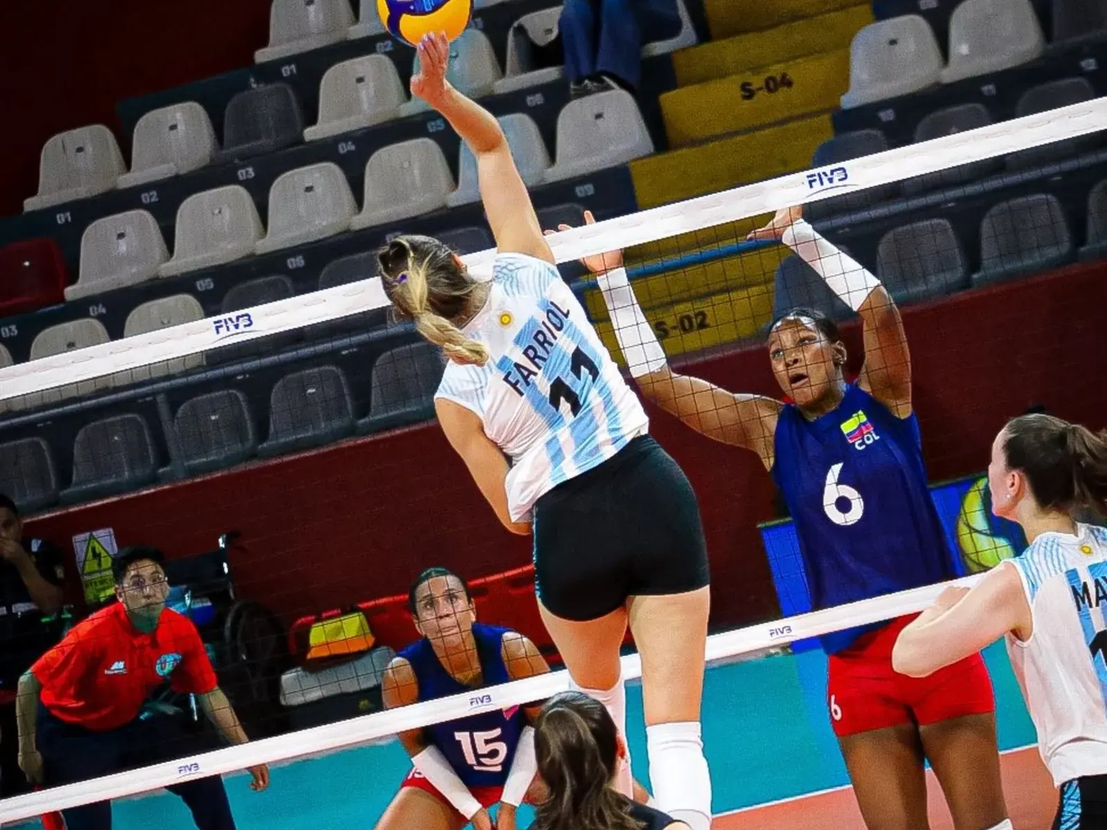 Argentina's Bianca Farriol attempts a spike against Colombia's block during the Copa Sudamericana group stage match in Lima.