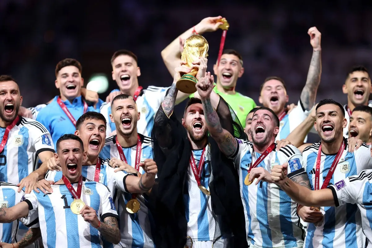 A jubilant scene of players celebrating with the FIFA World Cup trophy at the 2026 tournament.