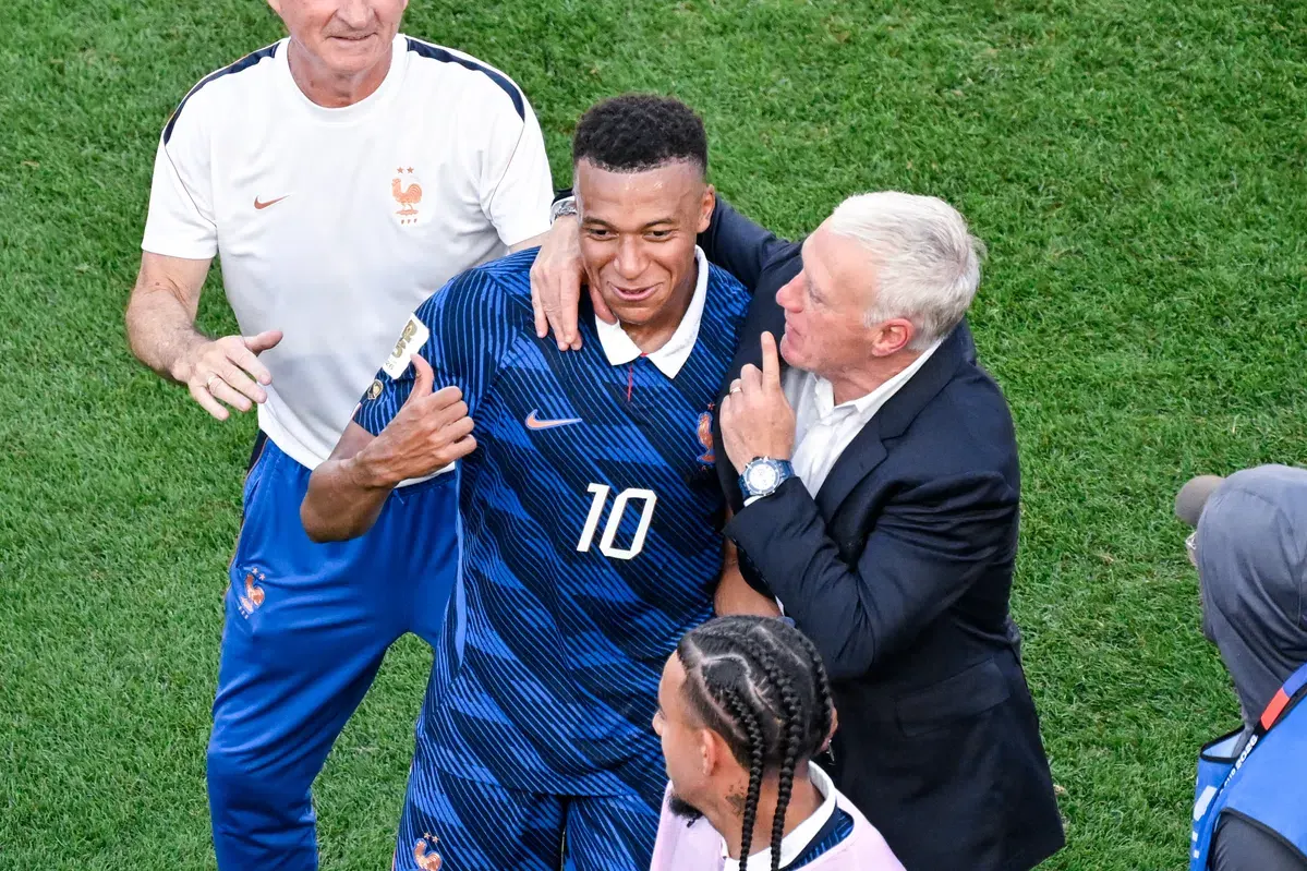 Kylian Mbappé in action for the France national football team during a match.
