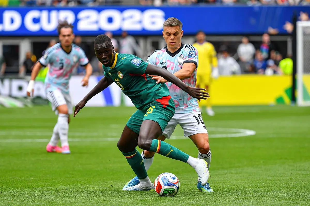 Pape Gueye in action for the Senegal national football team.
