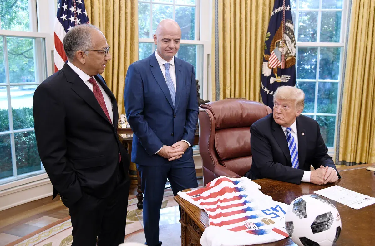 Carlos Cordeiro speaking at a football event, former US Soccer president and FIFA senior advisor