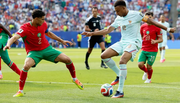 France Overcomes Morocco in Tense World Cup Quarter-Final, Mbappe Makes History