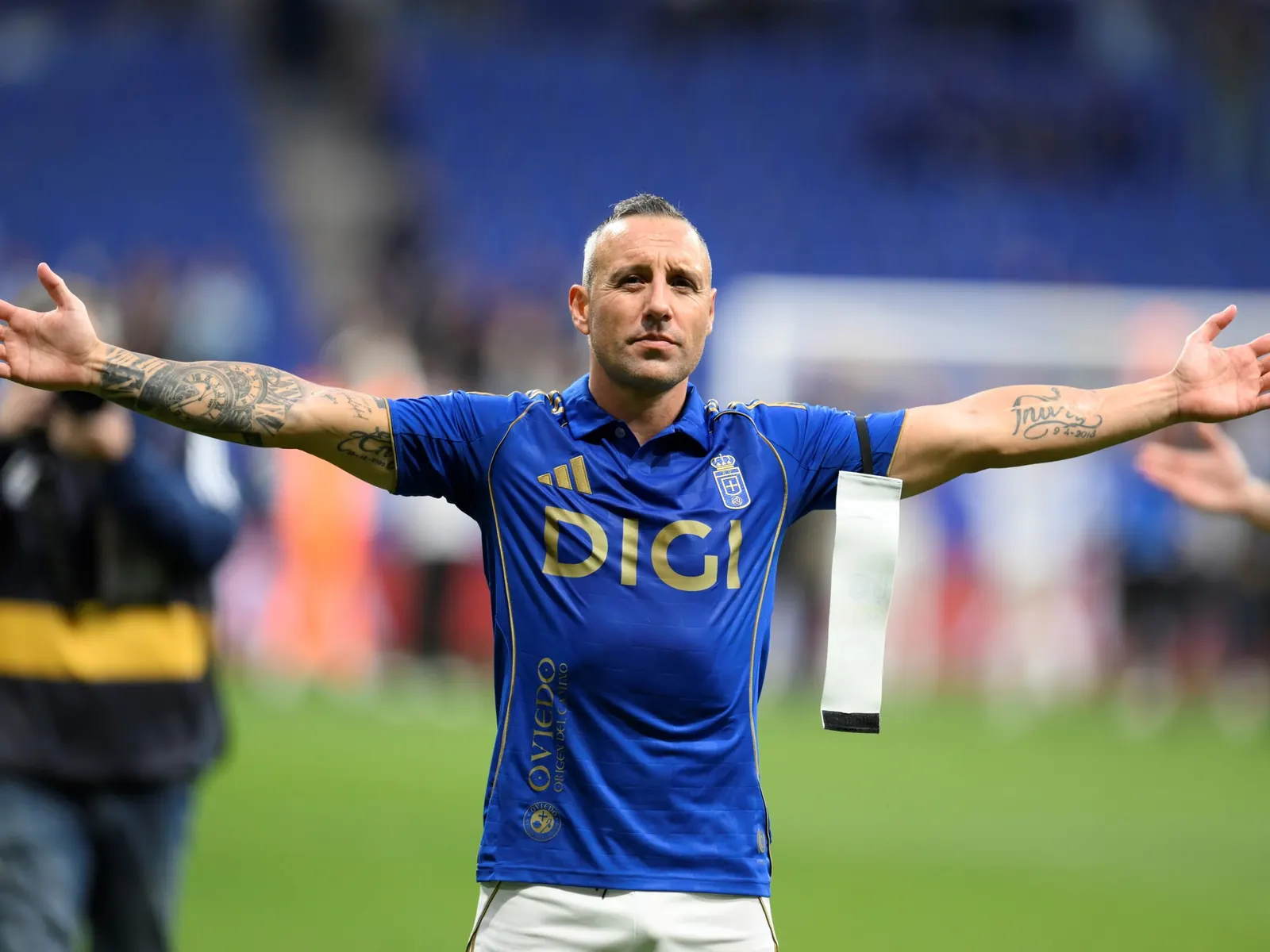 Santi Cazorla in action on a football pitch