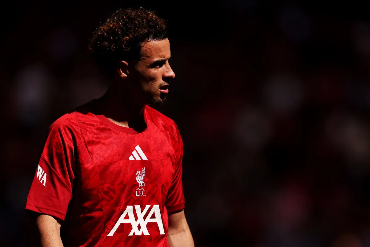 Liverpool midfielder Curtis Jones warming up ahead of a Premier League match at Anfield, May 2026.