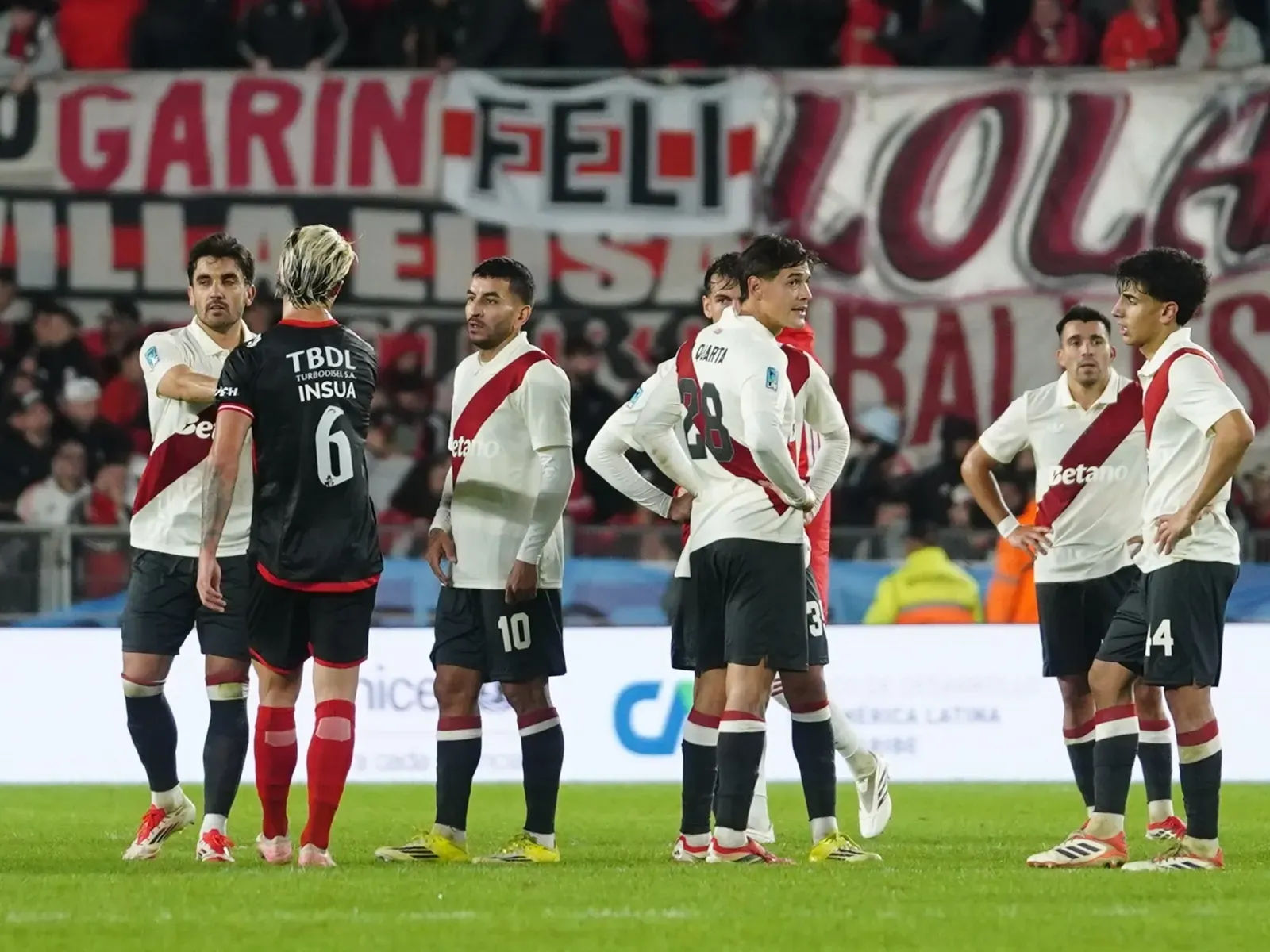 River Plate players on the pitch during a match at the Estadio Monumental.