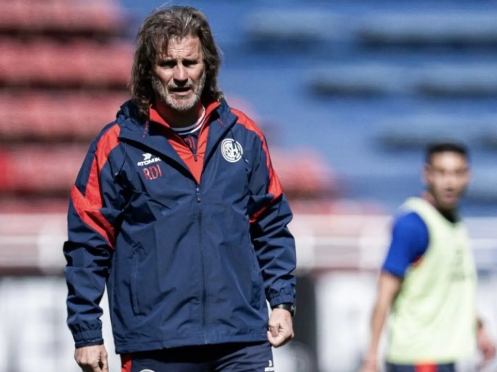 Ruben Dario Insua directs a San Lorenzo training session at the club's practice facility